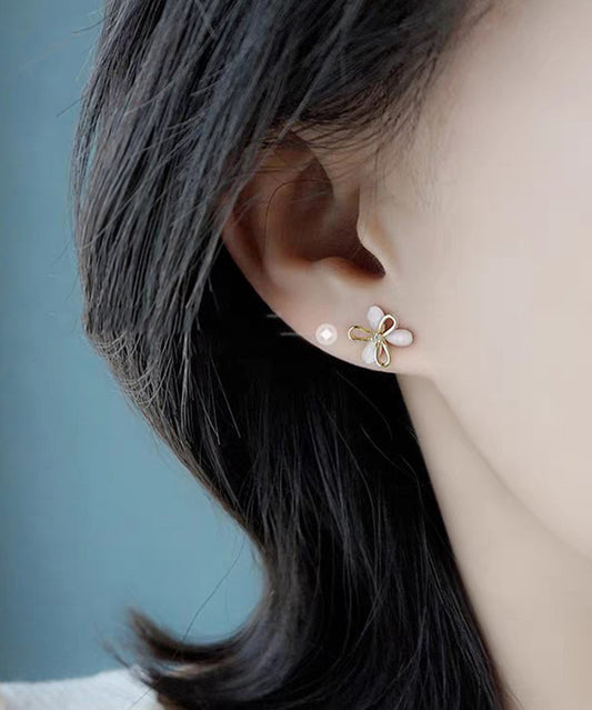 Brief White Copper Alloy Hollow Out Floral Stud Earrings