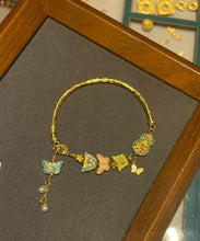 Load image into Gallery viewer, Fine Gold Ancient Gold Pearl Enamel Butterfly Tassel Bangle