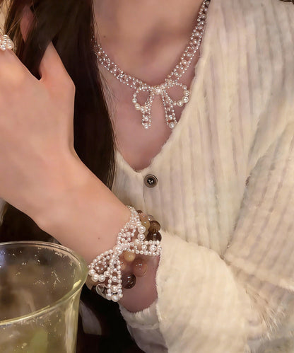French Pearl Bow Sweater Necklace And Bracelet Set