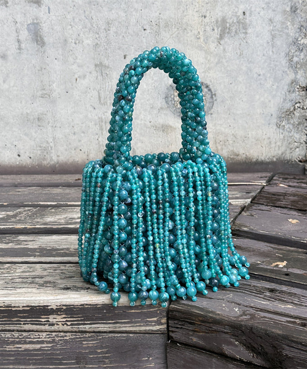 Modern Peacock Blue Beaded Weave Tassel Clutch