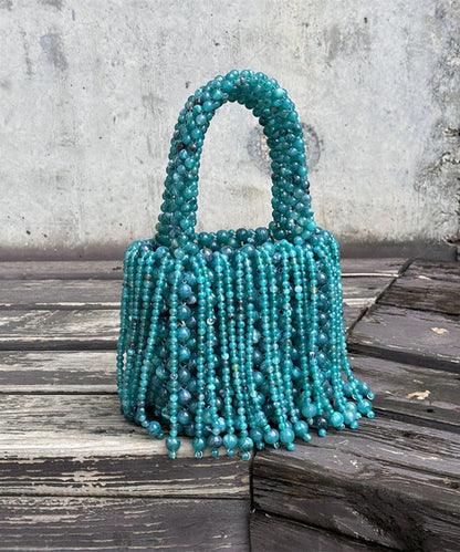 Modern Peacock Blue Beaded Weave Tassel Clutch