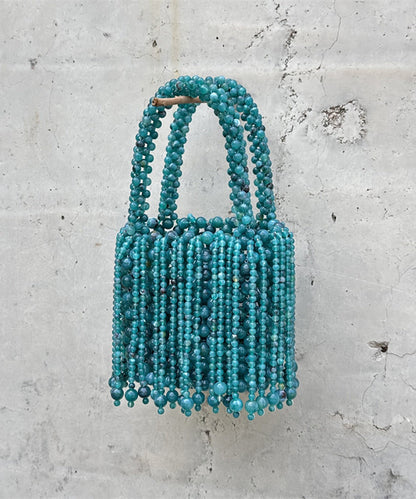 Modern Peacock Blue Beaded Weave Tassel Clutch