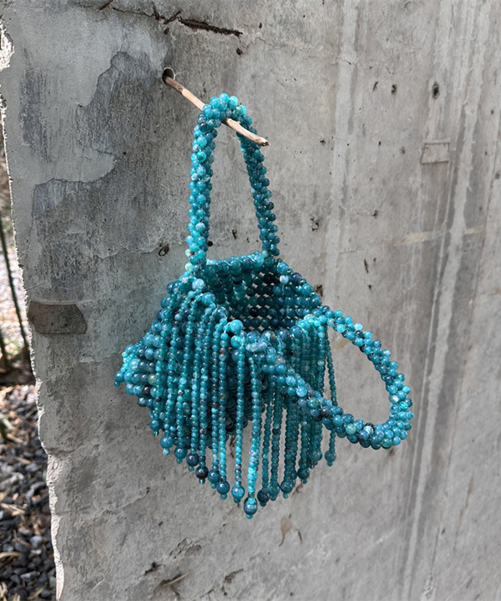 Modern Peacock Blue Beaded Weave Tassel Clutch