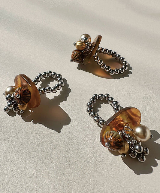 Stylish Brown Tassel Bead Glazed Titanium Steel Rings