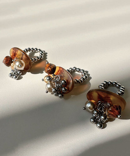 Stylish Brown Tassel Bead Glazed Titanium Steel Rings