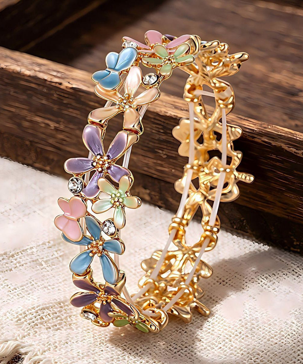 Stylish Rainbow Alloy Zircon Hollow Out Floral Bangle