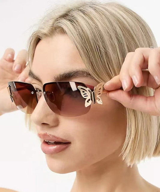 Stylish Tea Color Butterfly Shaped Diamond Studded Frameless Sunglasses