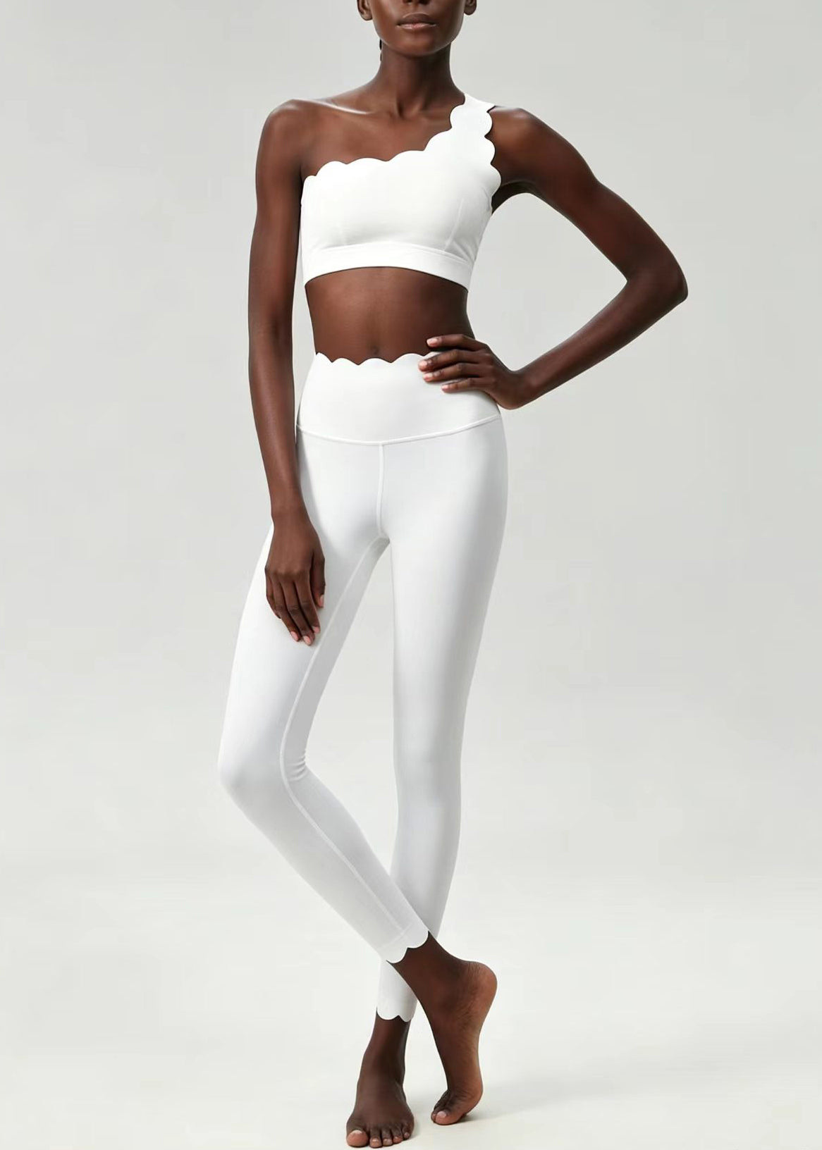 Stylish White Scalloped Asymmetrical Sleeveless Sports Bra And Leggings Set Suit
