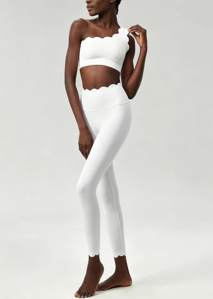 Stylish White Scalloped Asymmetrical Sleeveless Sports Bra And Leggings Set Suit