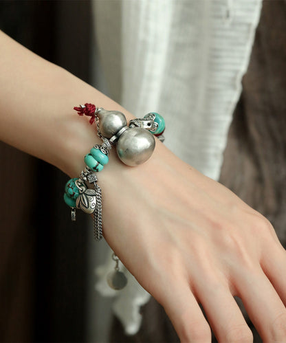 Vintage Silk Sterling Silver Calabash Turquoise Charm Bracelet