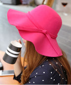 Stylish Mulberry Wave Brim Bow Woolen Cloche Hat